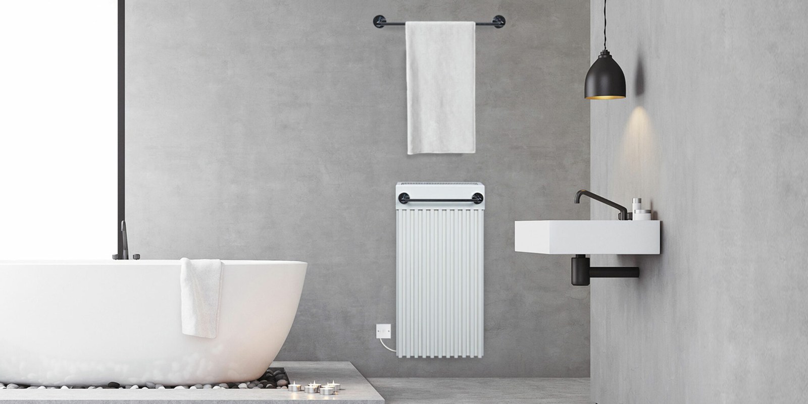 Fischer Luxe bathroom radiator with integrated towel rail beside a bathtub